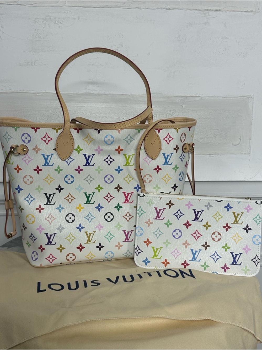 New with tags. M27787. Louis Vuitton neverfull MM LV x TM. Dust bag. Wristlet.